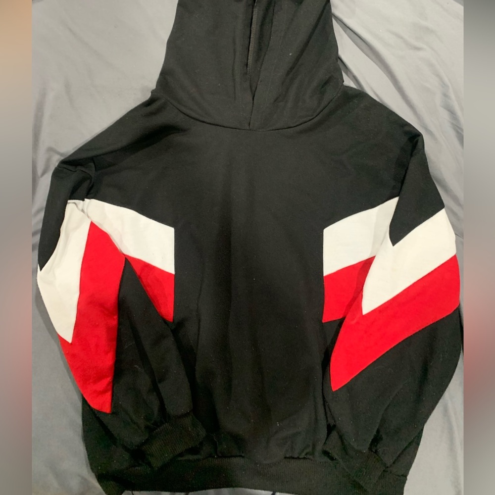 Black hoodie with red and white stripes